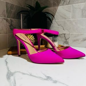 High heeled, hot pink shoes.